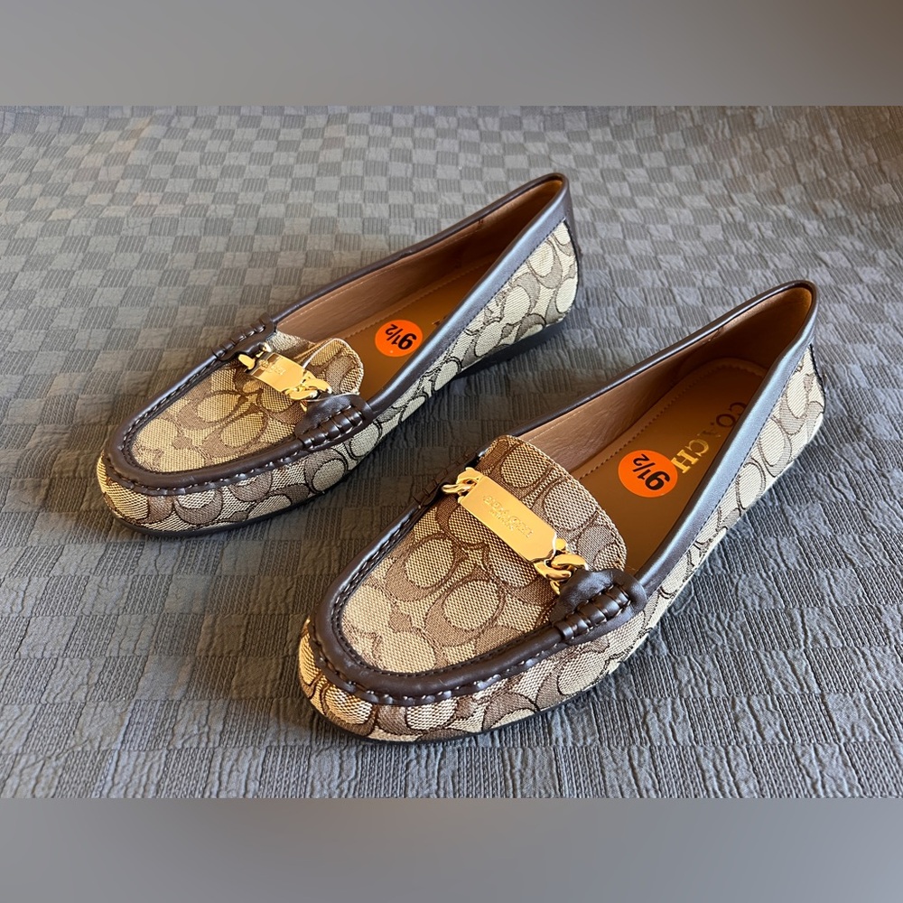 Coach moccasins. New with tag. Never worn.